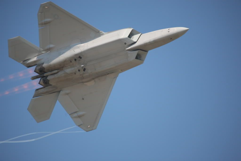 Belly of an F-22 with thrust extended