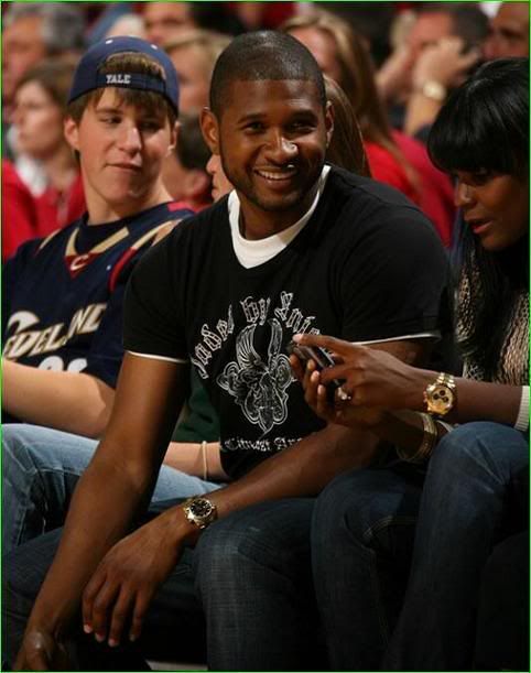 usher and tameka at the cavs game