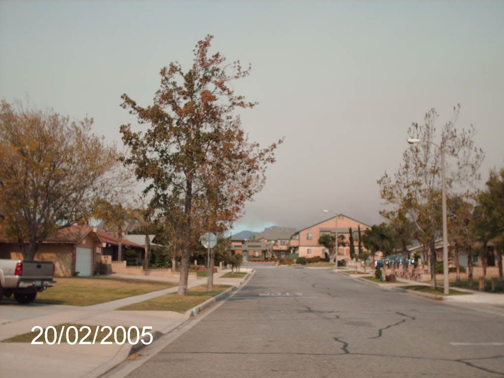 wind damage and smoke filled sky pics from Fontana (Riverside condo