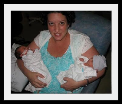 Mommy holding the Twinsies