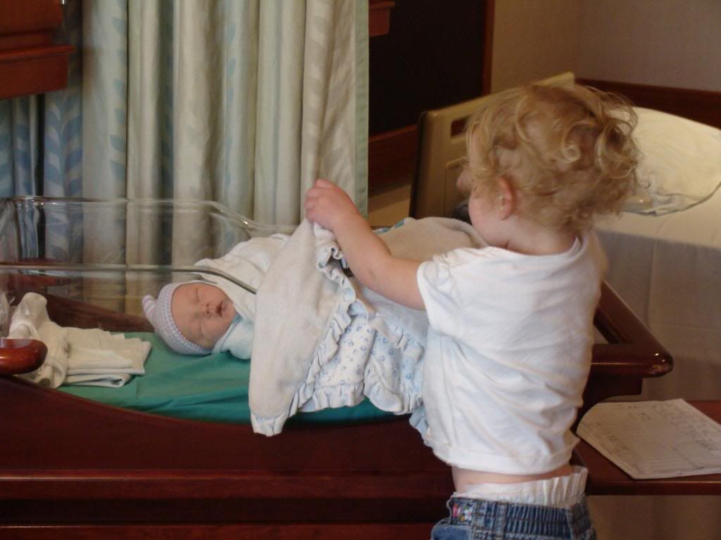 Giving her a blanket